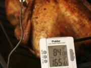 Federal guidelines state that your turkey is safe to eat when the innermost part of the thigh reaches 165 F. Some people say thigh meat tastes better at 170 F.