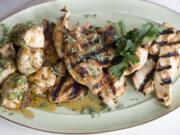 Three types of chicken, from left, a Sticky Orange-Cilantro Smothered Chicken, a Spiced-Rubbed Chicken Breast and Miso-Lime Marinated Chicken Strips