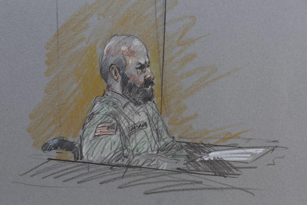 This court room sketch shows Maj. Nidal Malik Hasan during his court-martial Tuesday in Fort Hood, Texas.