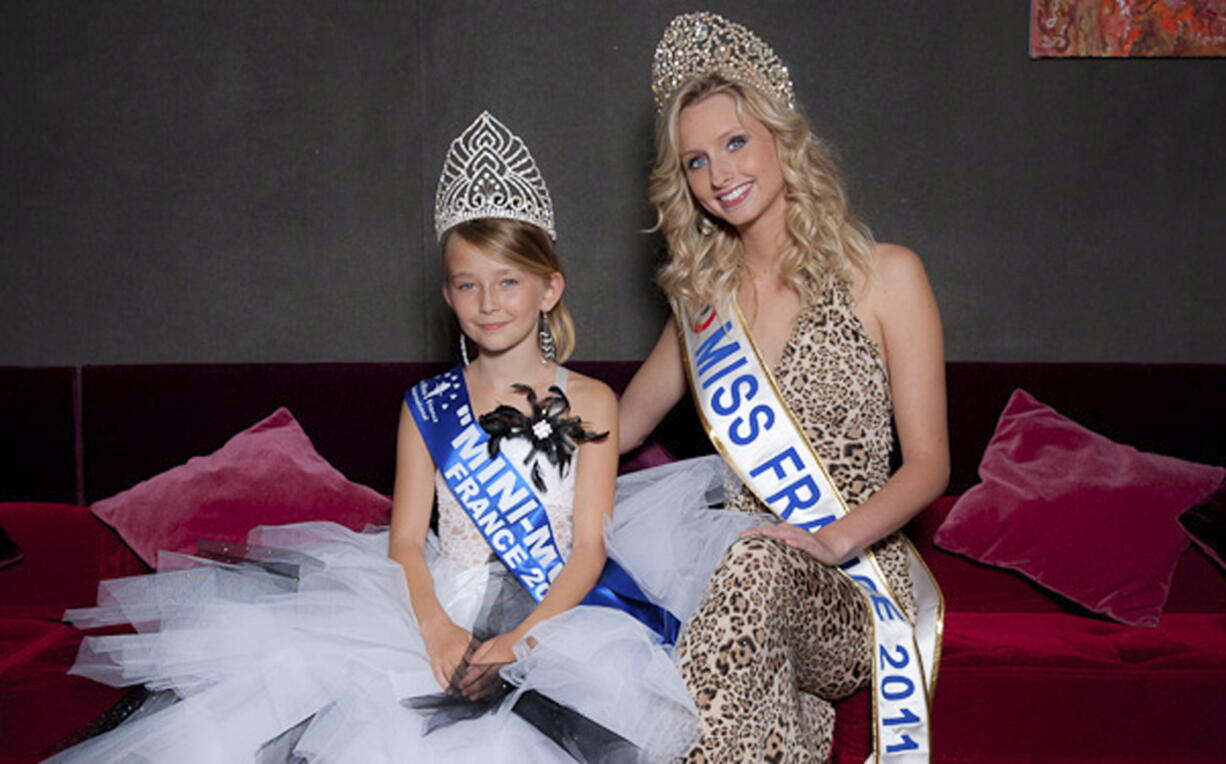 Mini Miss Committee
Oceane Scharre, 10, elected Mini Miss France 2011, left, sits with Miss France 2011 Mathilde Florin. France's Senate voted Tuesday night to ban beauty pageants for children younger than 16.