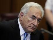 Former International Monetary Fund leader Dominique Strauss-Kahn listens to proceedings in New York State Supreme court in New York in 2011.