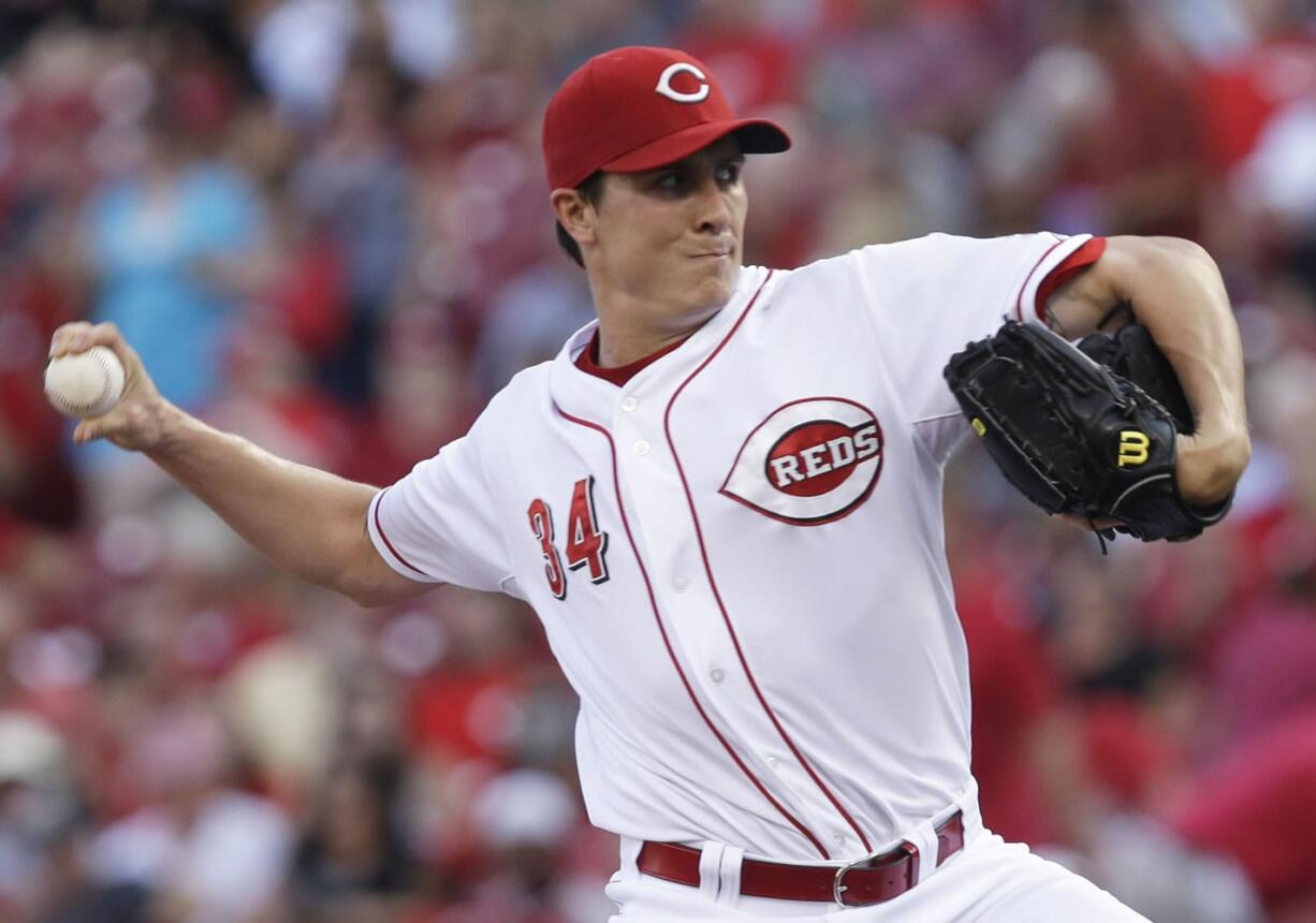 Cincinnati Reds starting pitcher Homer Bailey throws to a San Francisco Giants batter in the first inning of a baseball game, Tuesday, July 2, 2013, in Cincinnati.