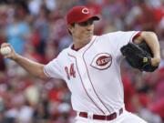 Cincinnati Reds starting pitcher Homer Bailey throws to a San Francisco Giants batter in the first inning of a baseball game, Tuesday, July 2, 2013, in Cincinnati.