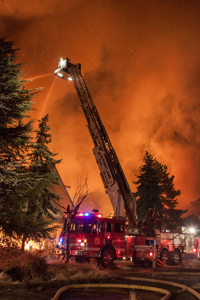 Firefighters battle a five-alarm fire at the former Red Lion Hotel on Jantzen Beach early Sunday morning.