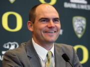 Mark Helfrich is introduced as Oregon's new head coach during a news conference in Eugene on Sunday.