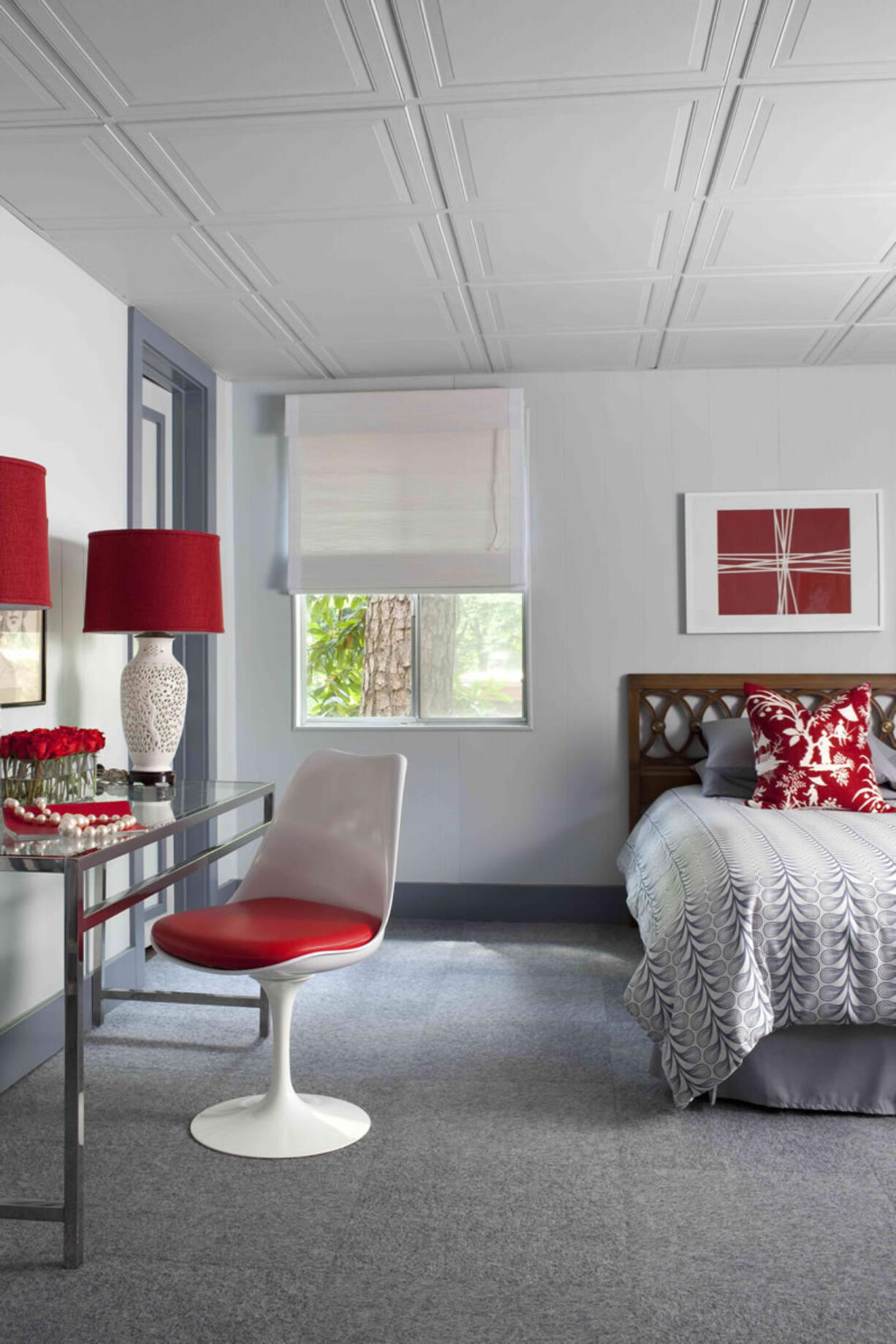 Brian Patrick Flynn designed a basement bedroom entry with a drop ceiling with high-end tiles complete with paneled, architectural detail.