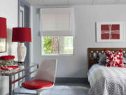 Brian Patrick Flynn designed a basement bedroom entry with a drop ceiling with high-end tiles complete with paneled, architectural detail.