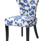 Blue and white prints, such as the fabric on this upholstered HomeGoods chair, are a big trend this spring.