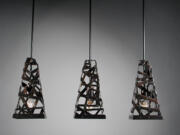 Rafael Avramovich's &quot;Harmonious Existence/Light Pendant&quot; lights of oxidized copper.