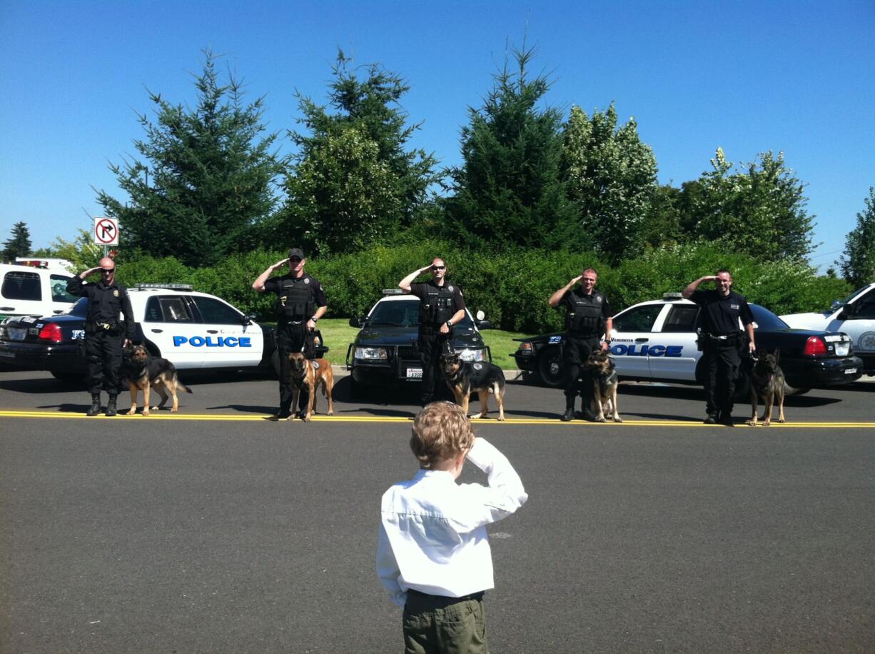 Honorary Sheriff Carter Harris met the regional police K-9 group on Aug.