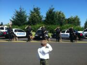 Honorary Sheriff Carter Harris met the regional police K-9 group on Aug.