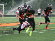 Bobby Jacobs eclipsed the 100-yard rushing mark and scored a touchdown for Washougal Friday, at Fishback Stadium.