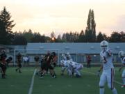 The sun sets on the horizon, as the Washougal and Fort Vancouver high school football teams play at Fishback Stadium Friday night.