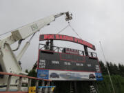 The new 32-foot long scoreboard stands 31 feet, 6 inches tall at Doc Harris Stadium.