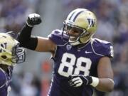 Washington's Austin Seferian-Jenkins (88) celebrates his touchdown against Idaho State with Kevin Smith in the first half of an NCAA college football game Saturday, Sept. 21, 2013, in Seattle.