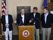 From left, Sen. John McCain, R-Ariz., Sen. Chuck Schumer, D-N.Y., Sen. Jeff Flake, R-Ariz., and Sen. Michael Bennett, D-Colo., address the media during a news conference after their tour of the Mexico border with the United States on March 27 in Nogales, Ariz.