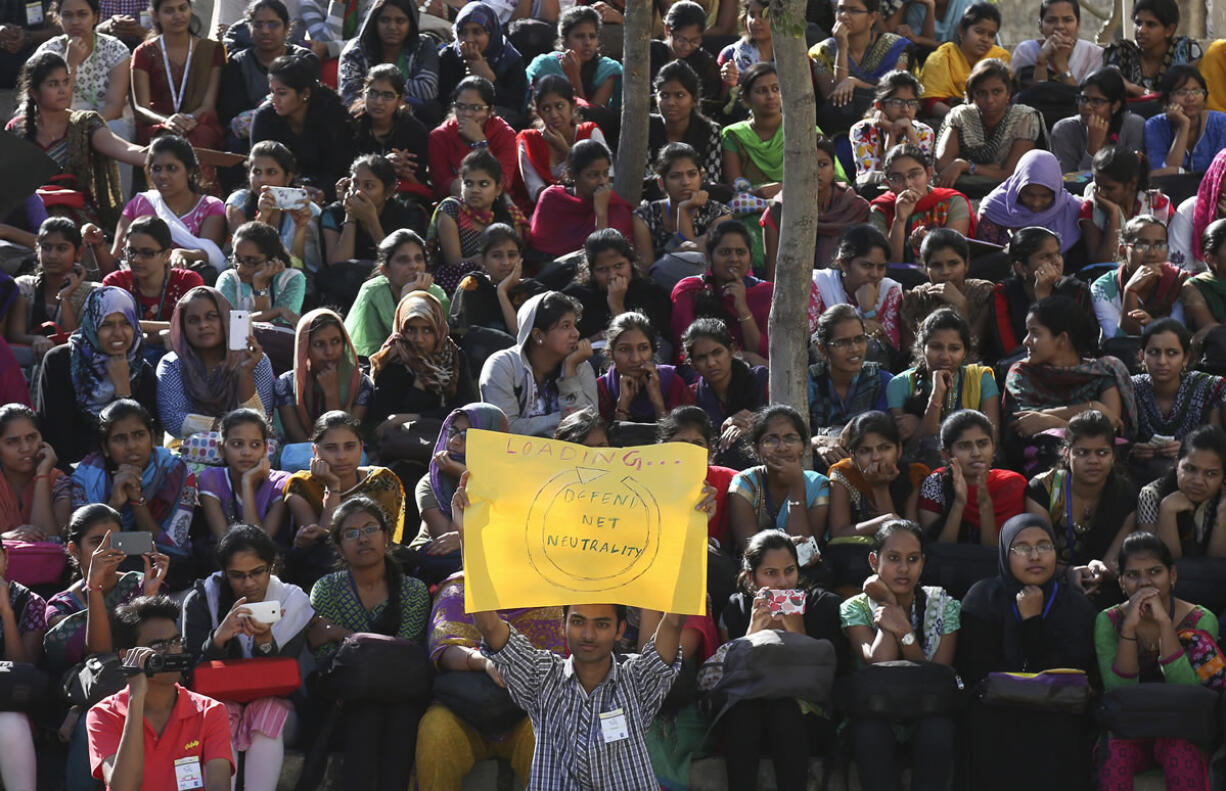 Indian students gather for a protest against Facebook&#039;s &quot;Free Basics&quot; in Hyderabad, India, on Tuesday. Promoted by Facebook founder Mark Zuckerberg, Free Basics offers free Internet access to a few websites to people who do not have any access to the Internet.