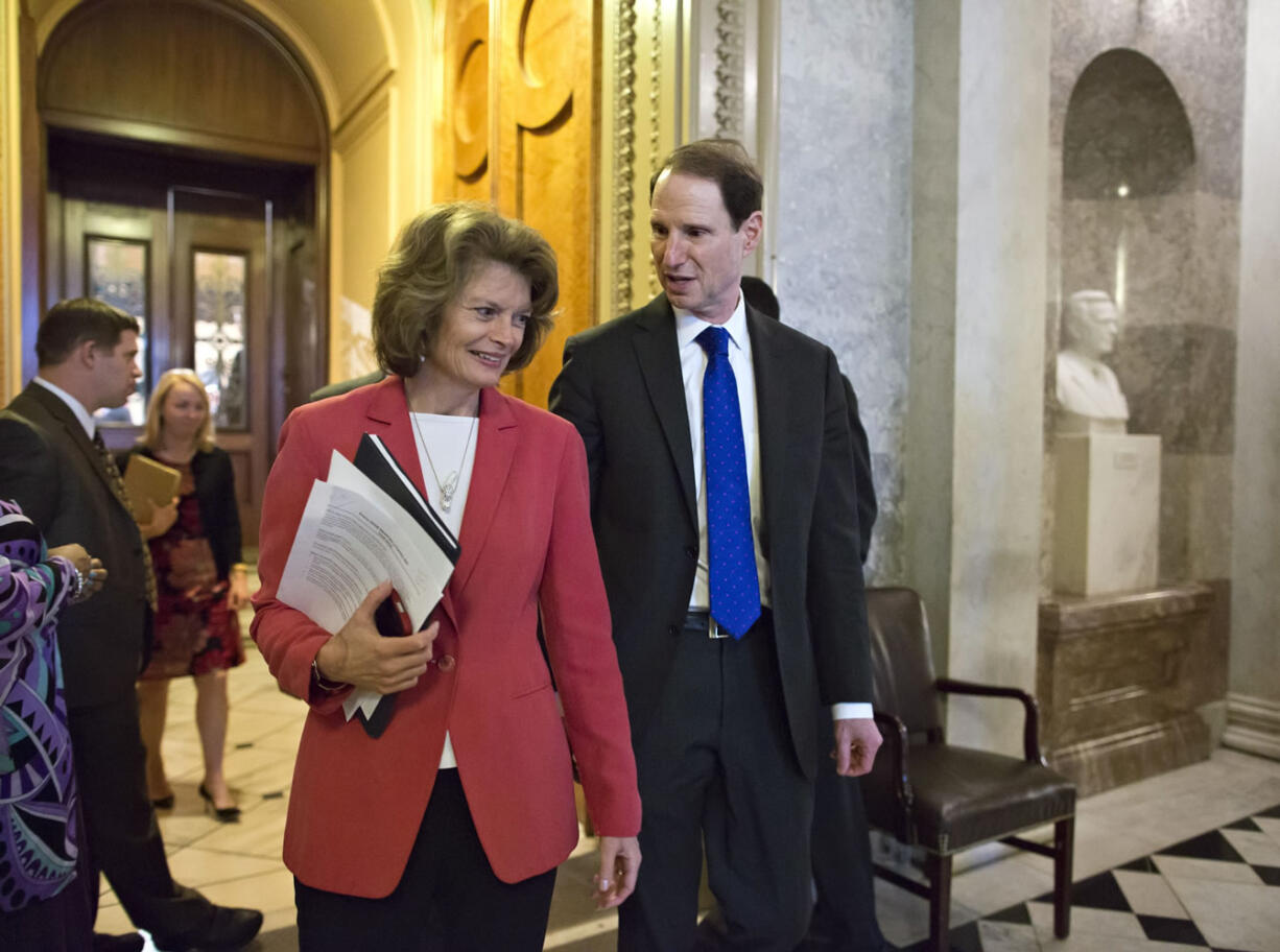 Sen. Lisa Murkowski, R-Alaska, left, and Sen.