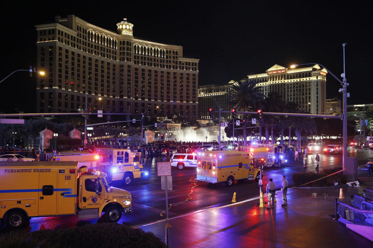 Police and emergency crews respond to the scene of a car accident along Las Vegas Boulevard on Sunday in Las Vegas.