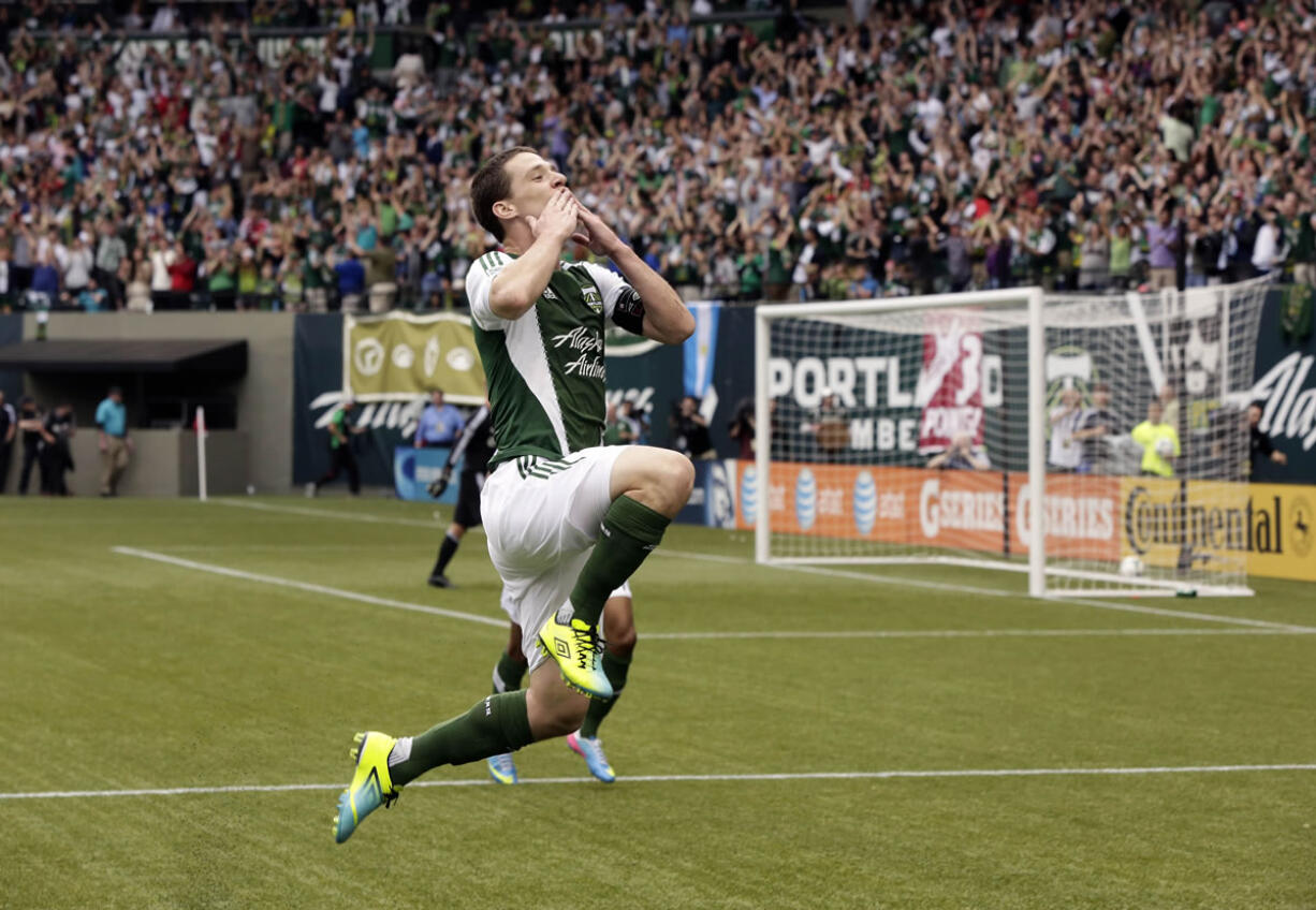 Portland Timbers midfielder Will Johnson blows a kiss to the crowd after scoring a goal against Chivas USA in Portland on May 12.