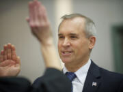 David Madore takes the oath of office Wednesday to start his term as a Clark County commissioner.