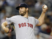 The Seattle Mariners have obtained left-hander Wade Miley (pictured here) and reliever Jonathan Aro from the Boston Red Sox for reliever Carson Smith and pitcher Roenis Elias, Monday, Dec. 7, 2015.