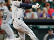 Seattle Mariners' Nick Franklin hits a grand slam in the second inning against the Houston Astros.