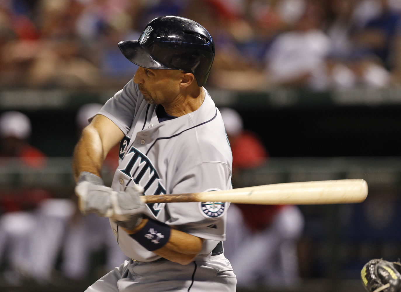 Raul Ibanez swings for a two-run home run against the Texas Rangers during the seventh inning Thursday.