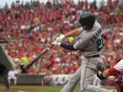 Seattle's Nick Franklin hits a two-run home run in the first inning Friday at Cincinnati.