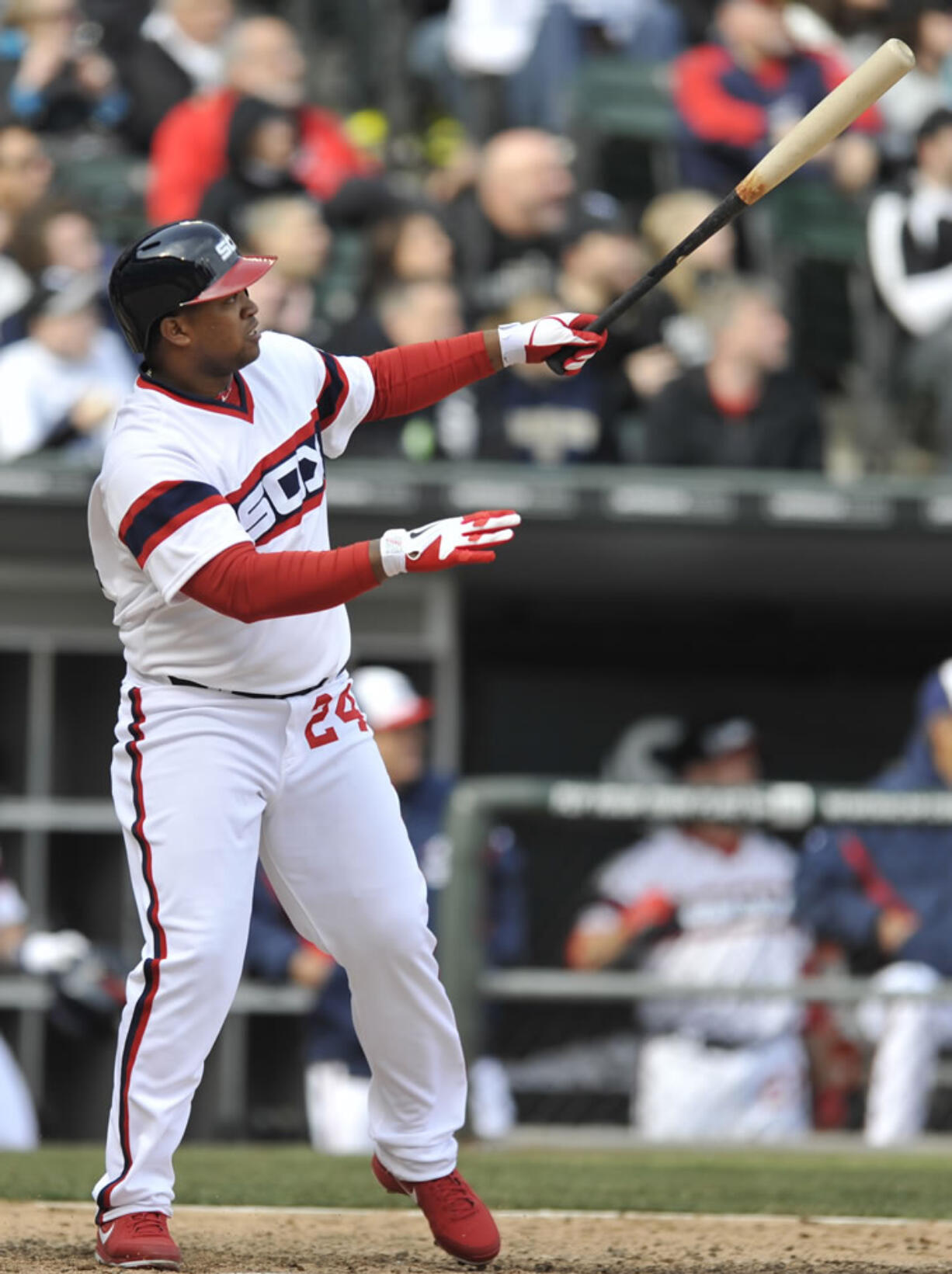 Chicago White Sox's Dayan Viciedo watches his walk-off home run during in the 10th inning Sunday to beat the Seattle Mariners 4-3.