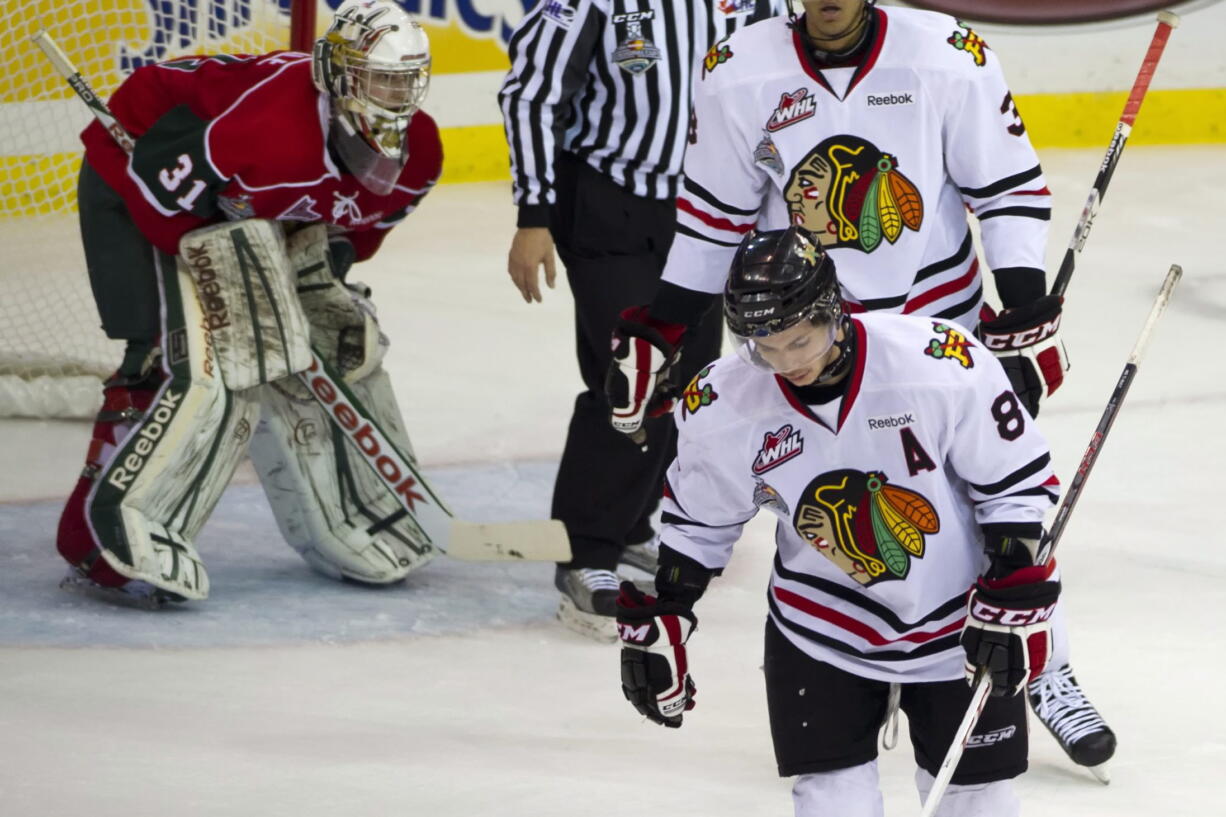 Portland Winterhawks right winger Ty Rattie skates away from Halifax Mooseheads goaltender Zachary Fucale after scoring a goal that would be disallowed during the second period Sunday.