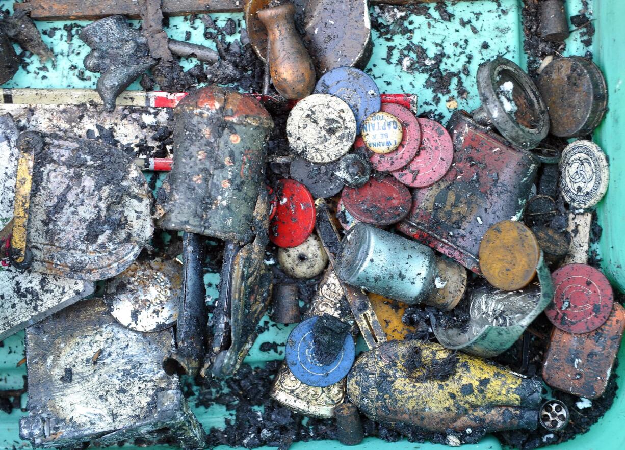 Antique toys, buttons, poker chips and other items found Wednesday in the rubble of the Butte Creek Mill fire will be cleaned and added back into mill owner Bob Russell&#039;s extensive antique collection.