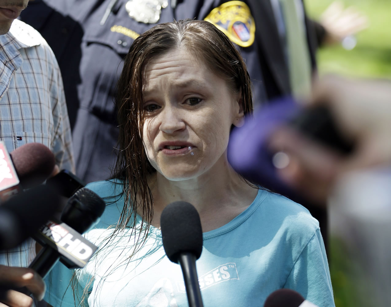 Beth Serrano, sister of Amanda Berry, speaks to the media after the arrival of Berry at Serrano's home Wednesday in Cleveland.