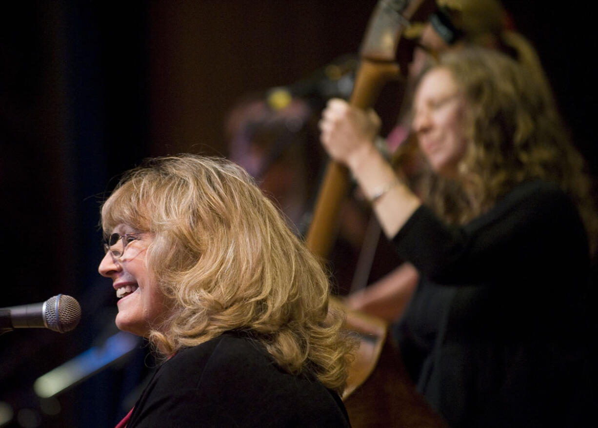 Misty River's Carol Harley and the rest of the band put on a &quot;Sing in to Spring&quot; concert in 2011 at Skyview High School.