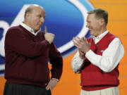 Paul Sakuma/Associated Press files
Ford Motor Company CEO and president Alan Mulally, right, listens to Microsoft CEO Steve Ballmer, left, during Mulally's keynote address Jan. 8 at the International Consumer Electronics Show in Las Vegas.