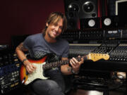 Keith Urban's latest album, &quot;Fuse,&quot; was released on Tuesday, three years after his previous album.