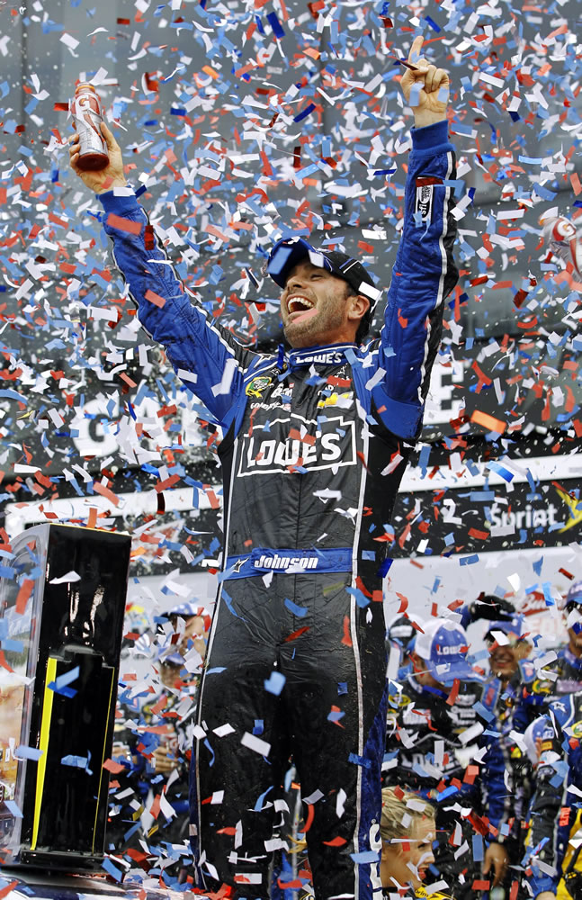 Jimmie Johnson celebrates in Victory Lane after winning the Daytona 500 on Sunday.