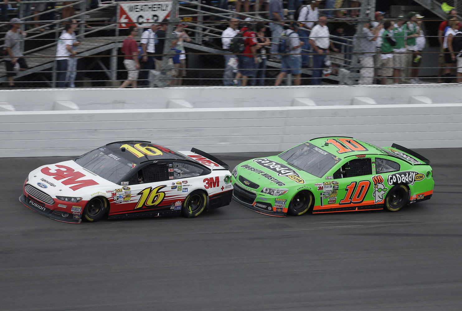 Greg Biffle (16) leads Danica Patrick (10) during the Daytona 500 on Sunday.