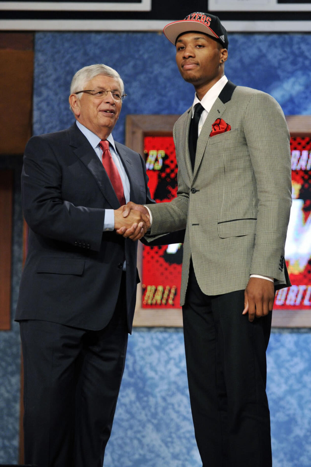 NBA Commissioner David Stern, left, poses with the No.