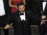 Director and producer Ben Affleck accepts the award for best picture for &quot;Argo&quot; during the Oscars at the Dolby Theatre in Los Angeles.