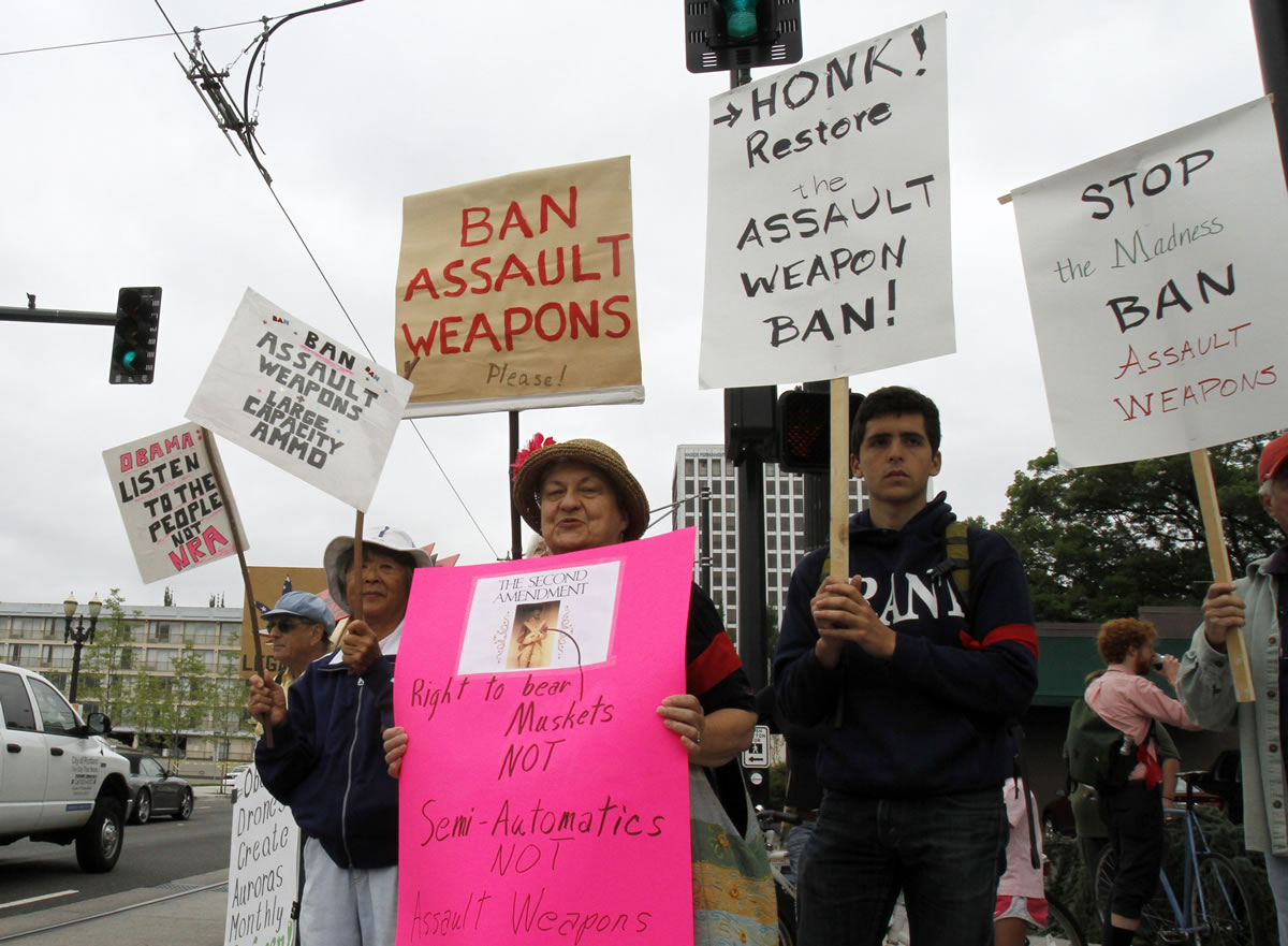 Protesters gather outside the Oregon Convention Center where President Obama is scheduled to appear Tuesday in Portland.