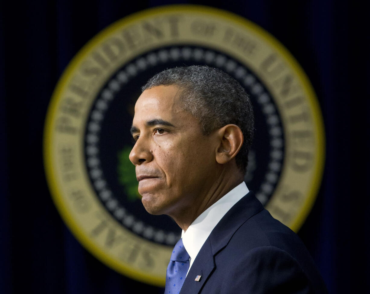 President Barack Obama pauses as he speaks in the South Court Auditorium on the White House complex Monday in Washington.