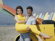 Singer Frankie Avalon and actress Annette Funicello are seen on Malibu Beach during filming of &quot;Beauty Party,&quot; in California in 1963.