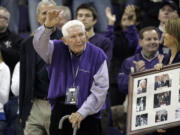 Former Washington head coach Marv Harshman acknowledges the crowd during a halftime ceremony in his honor on Nov. 14, 2009, at Hec Edmundson Pavilion in Seattle. Harshman, who spent 40 years coaching in the state of Washington, did Friday, April 12, 2013, the University of Washington said.