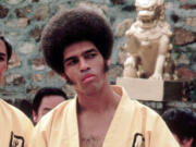 Jim Kelly plays Williams in a scene from &quot;Enter the Dragon.&quot; Kelly, who played a glib American martial artist in &quot;Enter the Dragon&quot; with Bruce Lee, died Saturday of cancer at his home in San Diego.