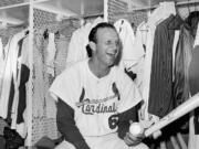 St. Louis Cardinals' Stan Musial, pictured here in the clubhouse in 1963, died Saturday at his home.