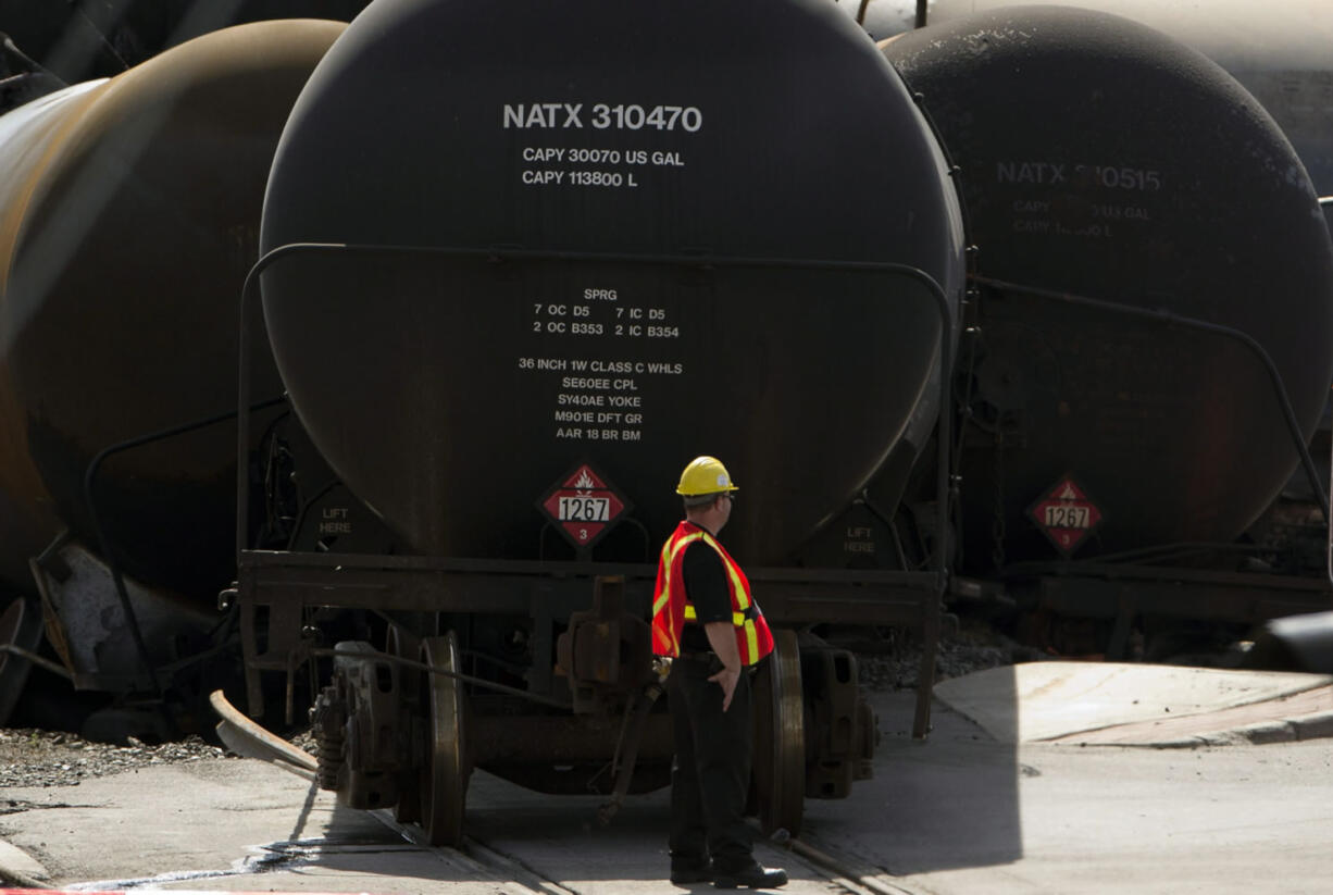 Work continues July 12 at the crash site on in Lac-Megantic, Quebec of a train that derailed, igniting tanker cars carrying crude oil that killed 50 people. U.S. and Canadian drillers are producing oil faster than new pipelines can be built. As a result, trains have become an unexpected yet vital way to move this bounty of energy from the continent's midsection to refineries along the coasts.