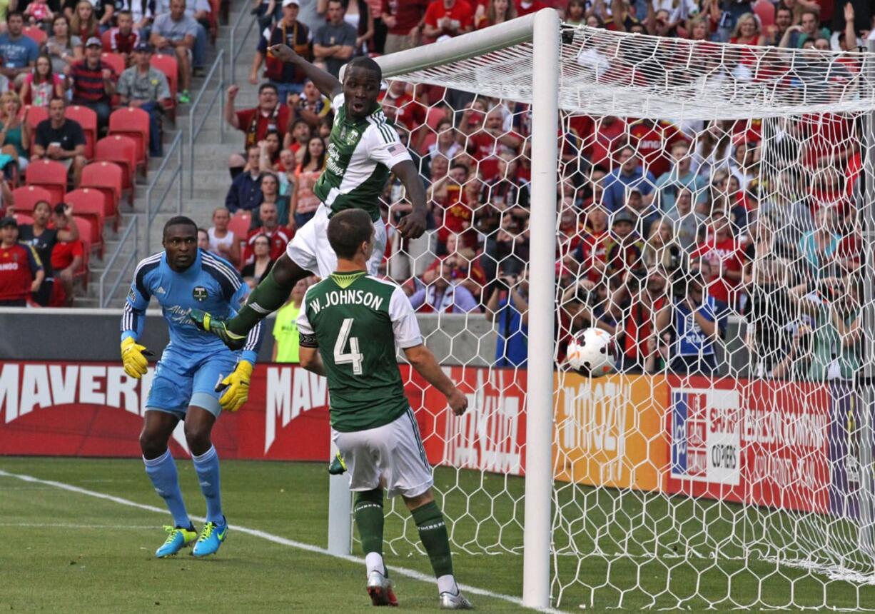 Portland Timbers' Donovan Ricketts, left, Andrew Jean-Baptiste, above, and Will Johnson watch a goal by Real Salt Lake during the first half of a U.S. Open Cup soccer game Wednesday in Sandy, Utah.