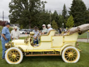 Frank Hurley, left, from Vancouver, shows off his 1907 Cartercar at the La Center Centennial Celebration car show in 2009.