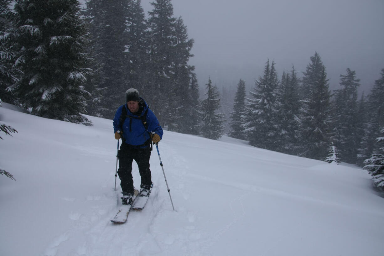 Carlos Cummings heads to the top of Todd Ridge at Todd Lake, Ore., on March 7, on his splitboard.